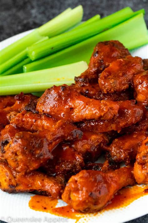 I've always preferred baking chicken wings in the oven, but i always get asked the same questions when telling others about them once the chicken wings have been parboiled and dried, you can toss them in a little oil and spice to infuse some extra flavor. Crispy Baked Buffalo Chicken Wings ~ Recipe | Queenslee ...