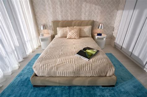 Neutral Contemporary Bedroom With Blue Rug Hgtv