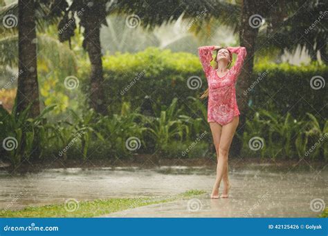 Portrait Of Beautiful Woman Under The Tropical Rain Stock Photo Image