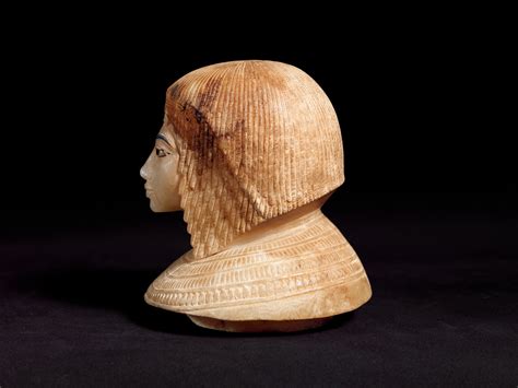 canopic jar 07 226 1 with a lid in the shape of a royal woman s head 30 8 54 new kingdom