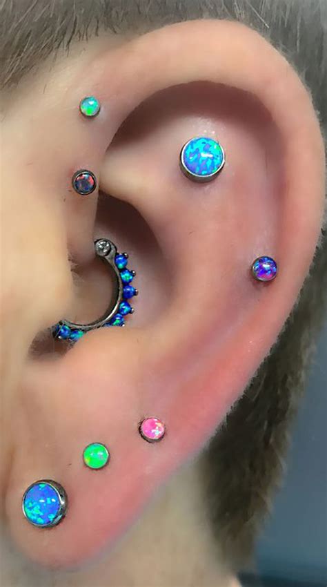 An Ear With Different Colored Stones On It