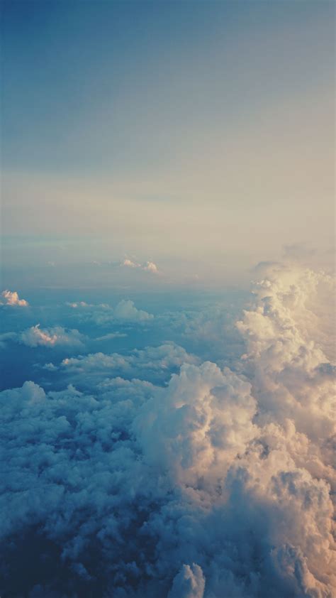 Download Wallpaper 1080x1920 Clouds Sky Porous Air Flight Samsung