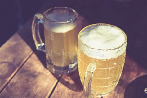 Close Up Two Cold Beers With Foam And Drops Stock Photo Image Of