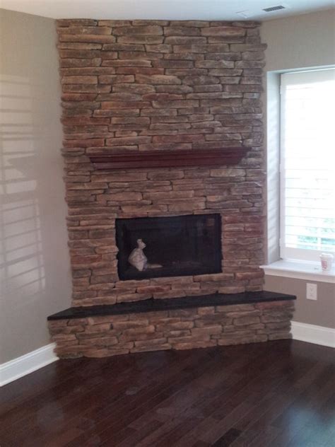 Fabulous floor to ceiling stacked stone fireplace design. Custom Corner Stone Direct Fireplace - Craftsman - Family ...