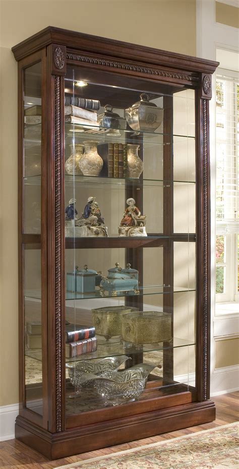 She has passed on, but her cleaning tricks for mixed material furniture, like a glass and about once a year it's necessary to deep clean the curio cabinet and everything inside. Pulaski Curio Cabinet 20485 Two Way Sldg Door Curio 20485