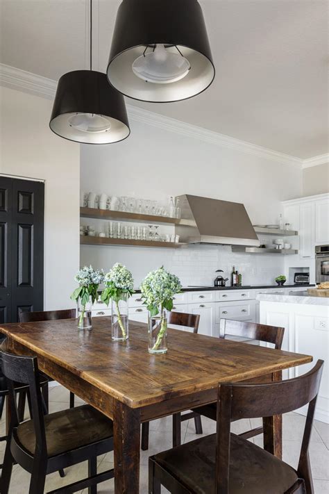 A model that is constructed with solid hardwood will provide strength and stability. Farmhouse Dining Table in Bright, White Kitchen | HGTV