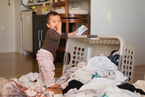 Happy Naughty Baby With Messy Laundry Clothes Poryuko Hirao