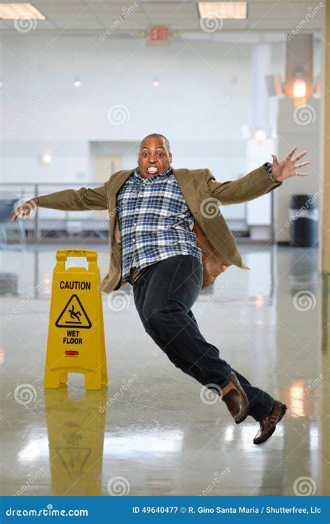 Businessman Slipping On Wet Floor Stock Image Image Of Businessman