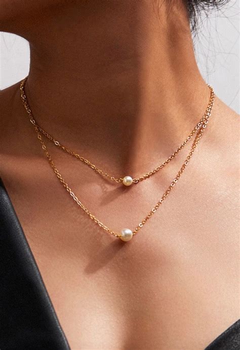 Layered Pearl Necklace In Gold