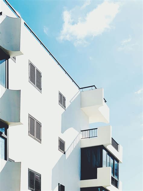 White Concrete Building Under Blue Sky During Daytime Photo Free City