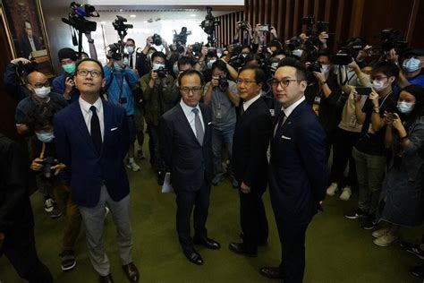 Hong Kongs Pro Democracy Lawmakers Resign En Masse