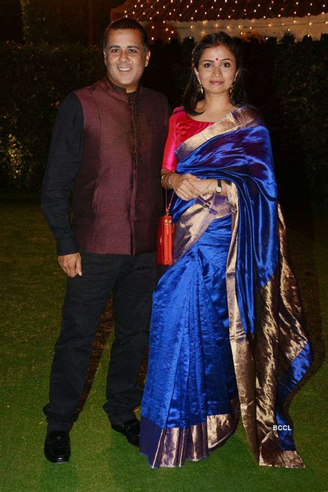 Author Chetan Bhagat Poses With His Wife Anusha At Ronnie Screwvalas