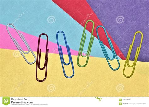 Scattered Paper Clips On A Colorful Background Stock Image Image Of