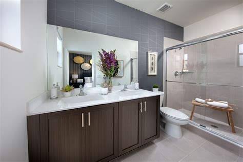 This En Suite Master Bath Boasts His And Her Sinks And A Glass Enclosed