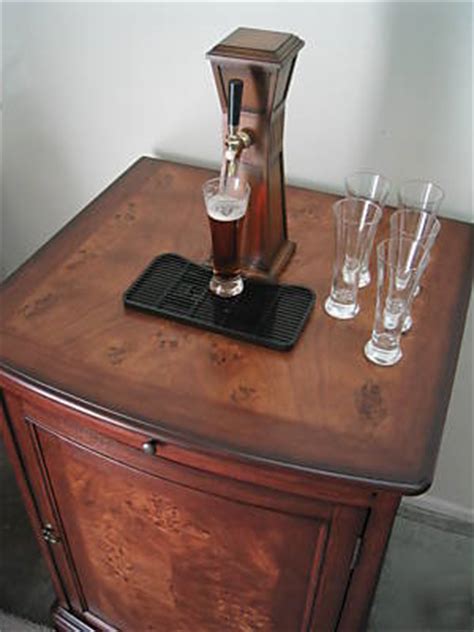 This kegerator can also accommodate either a half or quarter keg. Kegerator beer beverage bar fridge cooler wood cabinet