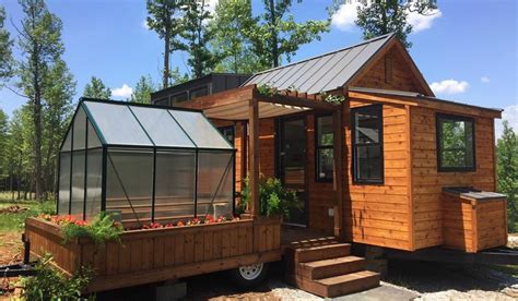 This Awesome Tiny Home Has A Greenhouse And A Porch Swing—and Its For Sale