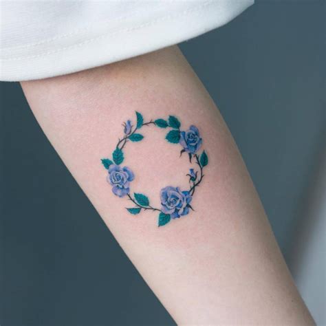 Delicate Floral Circle Tattoo