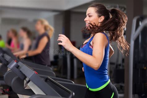 Beautiful Brunette On A Treadmill Stock Image Image Of Lifestyles