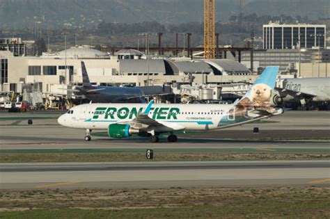 Frontier Airlines Stock Photos, Pictures & Royalty-Free Images - iStock