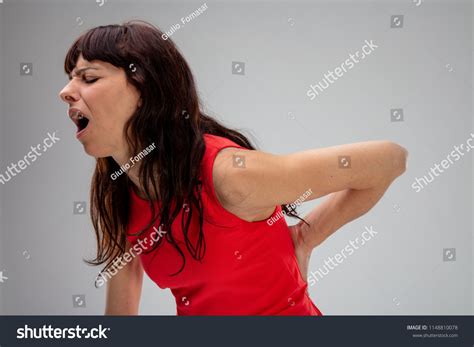 Woman Backache Groaning Pain She Holds Foto Stock Editar Agora