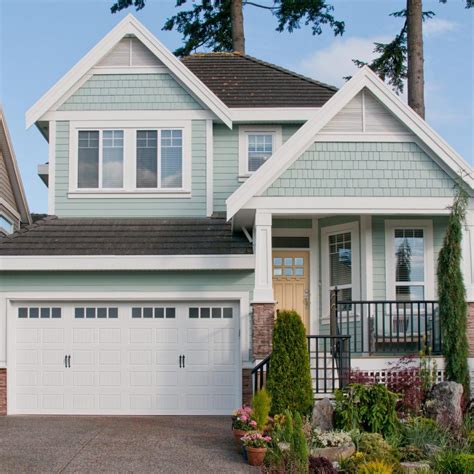 Architecture projects featuring shingles, including buildings with roofs or vertical surfaces clad in overlapping tiles made of wood and other materials. With Blue HC-143 | House paint exterior, Exterior paint ...