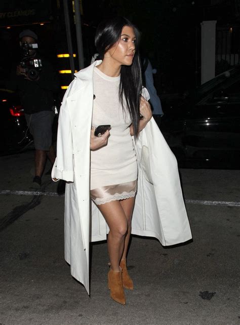 Kourtney Kardashian Flashes Major Leg During A Sexy Outing In La