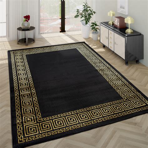 Nun, du hast glück, denn hier sind sie. Wohnzimmer-Teppich Goldene Bordüre Schwarz | TeppichCenter24