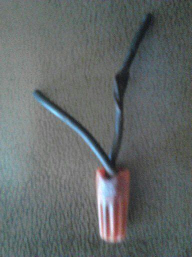 What causes an extension cord to melt on an outlet? Picture of that melted wire nut and wire from that crowded ...