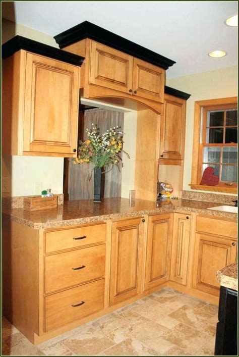 You'll get a perfectly straight cut that fits the edge of the drawer. Image result for under cabinet molding | Stained kitchen cabinets, Kitchen cabinet crown molding ...