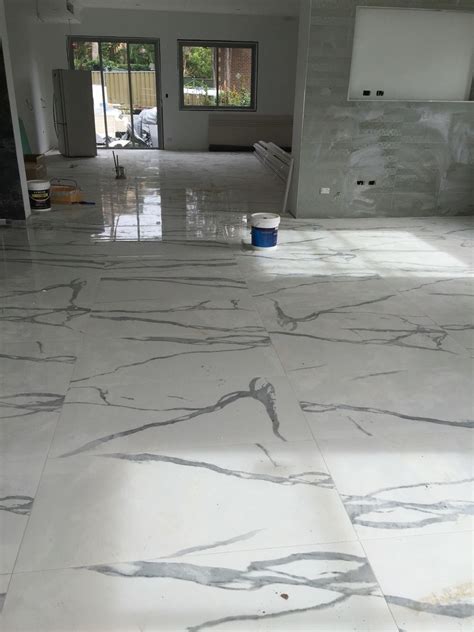 Kitchen wall tiles for black worktop ideas. 600x1200 Kajaria Statuario | House, Tiles, Towns