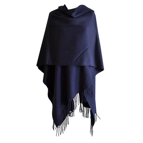 Sweat à capuche tissage ethnique bleu 55,00 €. Poncho bleu marine avec franges pour femme - Acheter ...