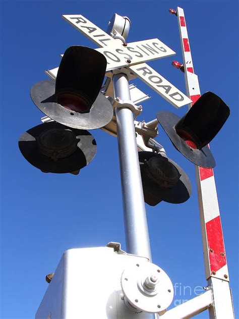 Railroad Crossing Sign And Gate Train Tracks A Train Railroad