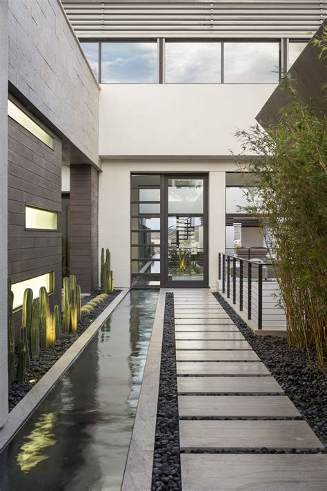 Blending Indoor And Outdoor Spaces And Incorporating Water