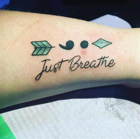 Arrow And Semicolon With Wording ‘just Breathe Tattoo On Arm