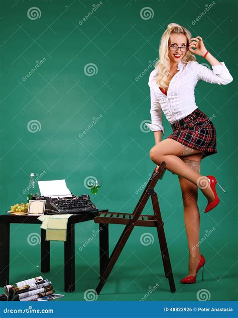 Pin Up Girl Secretary At The Reception Near The Typewriter Stock Photo Cartoondealer Com