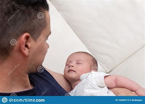 Father Lovingly Holding His Newborn Baby Tight Stock Image Image Of