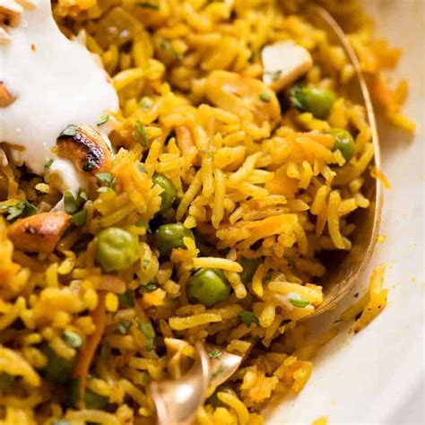 Delicious curried rice with cashews and raisins. Curried Rice | RecipeTin Eats