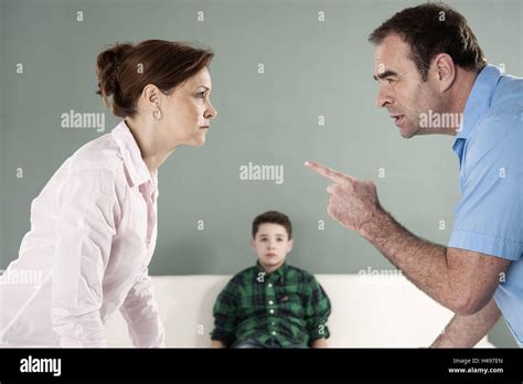 Mother And Father Argue In Front Of Her Child Stock Photo Alamy