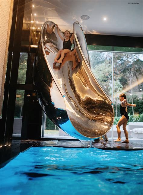 Splinterworks Custom Luxury Pool Slides In Stainless Steel And Resin