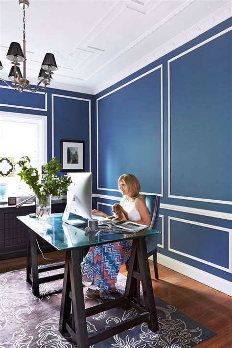 Study Home Office With Navy Blue Walls And White Trim Glass Trestle