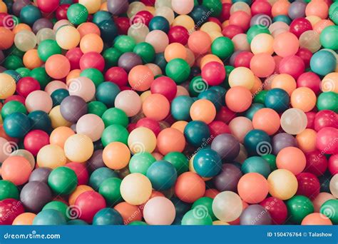 Lot Of Plastic And Colored Balls In A Chaotic Manner Stock Photo