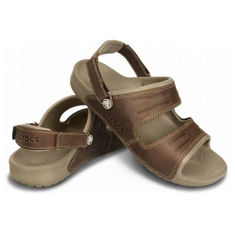 Crocs™ offers comfortable and versatile sandals for men to suit any activities from casual activities like going to the beach, to something a little more dressed up for a night in town. Crocs Crocs Yukon 2 Strap Khaki / Espresso (UX2) 14325-23G ...