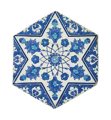 A Blue And White Iznik Pottery Tile