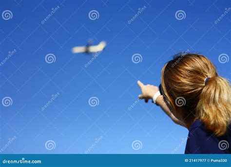 Woman Pointing Towards The Blue Sky Royalty Free Stock Photography