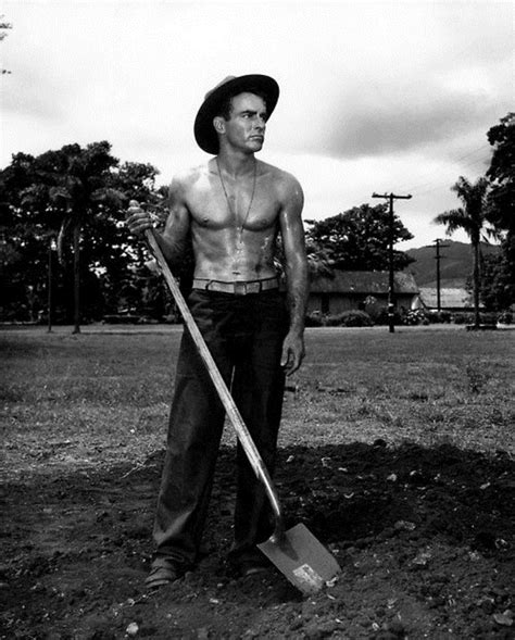 Montgomery Clift Holds A Shovel In A Scene From The Film From Here To