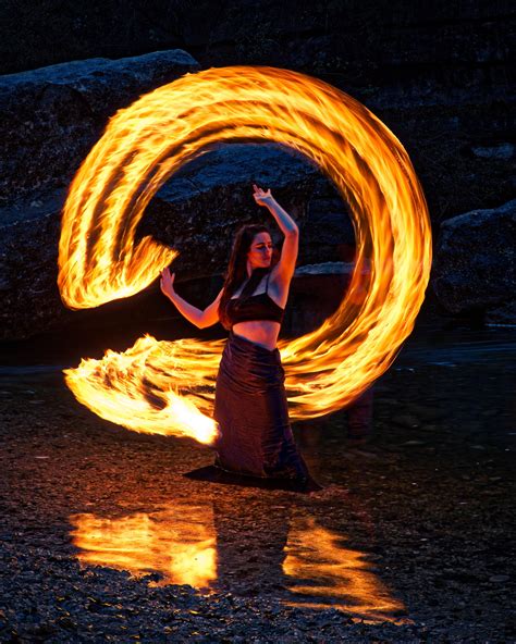 Itap Of A Model In Front Of A Ring Of Fire Ritookapicture