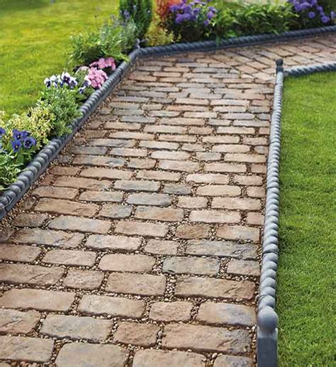 Learn how garden paths add interest and practicality to your landscape and are worth installing, whether you have acres or a small lot. Garden Path Edgings | Landscaping Services Bury Manchester