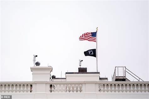 biden returns pow mia flag to prominent spot atop the white house after trump moved it