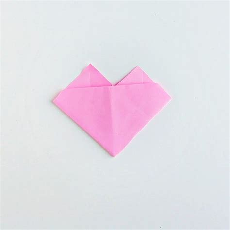 Instructions on how to fold a standard piece of notebook paper to look like a diamond. How to Fold a Paper Origami Heart + Cute Origami Heart ...