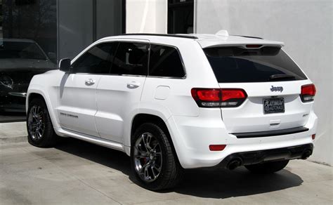 Unless otherwise noted, all vehicles shown on this website are offered for sale by licensed motor vehicle dealers. 2014 Jeep Grand Cherokee SRT Stock # 6147A for sale near ...